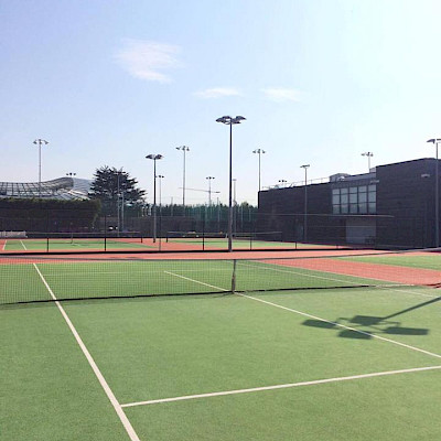 Green tennis court.